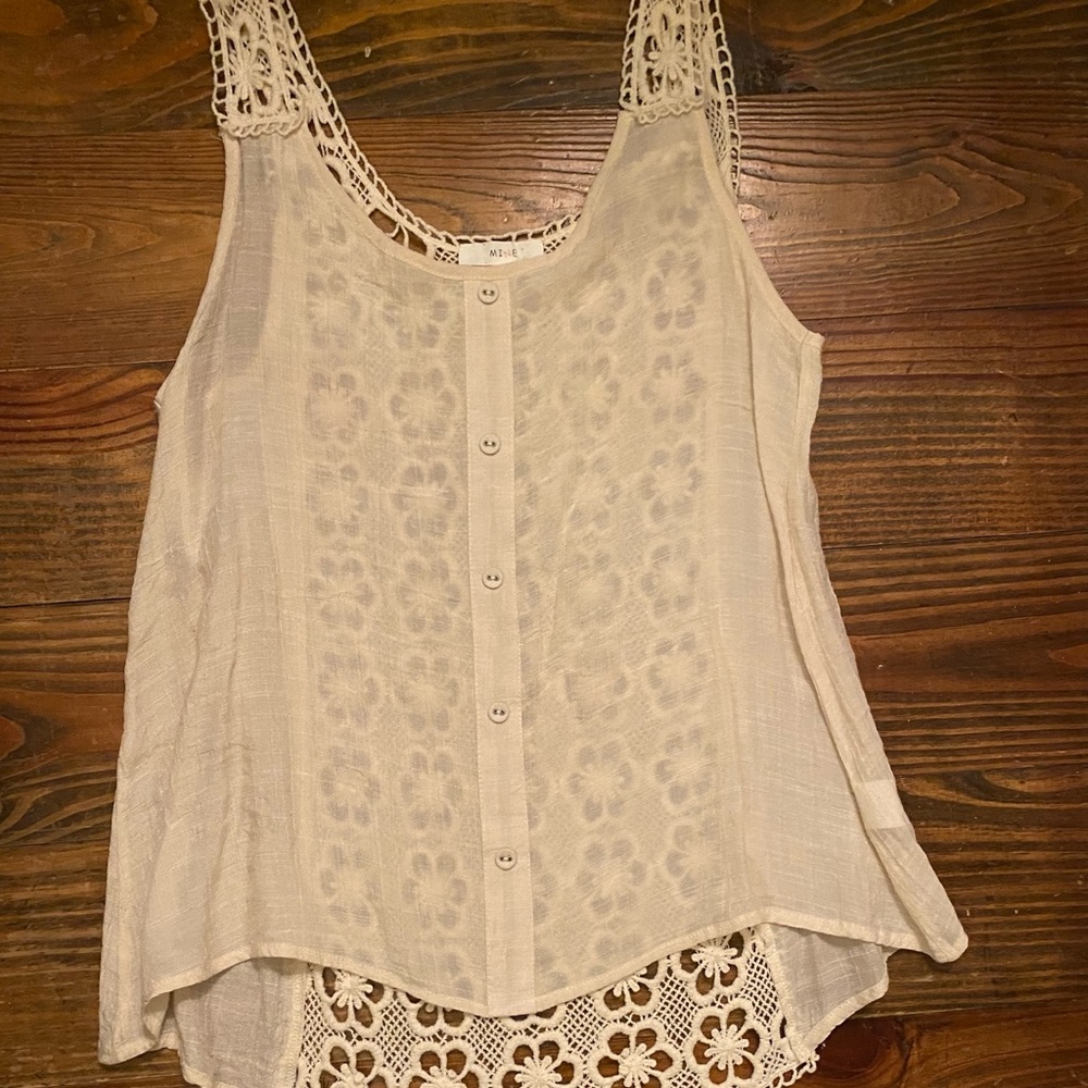 Linen and crochet top with cute buttons in front.